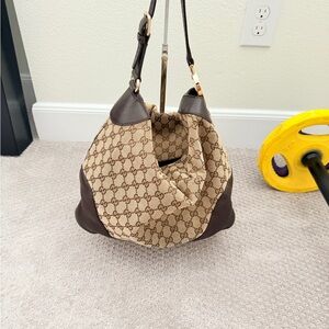 No longer for sale. 

Gucci Tan and Brown Hobo Bag